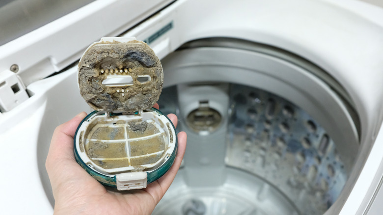 مسدود شدن فیلتر ماشین لباسشویی، تمیز کردن فیلتر ماشین لباسشویی، تعمیر ماشین لباسشویی در مشهد